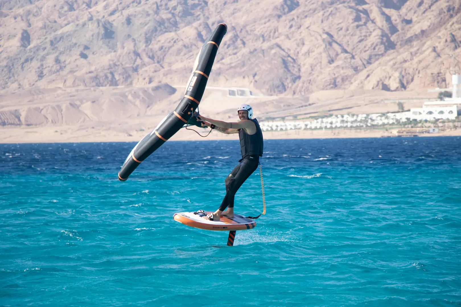A wingfoil lesson in the lagoon