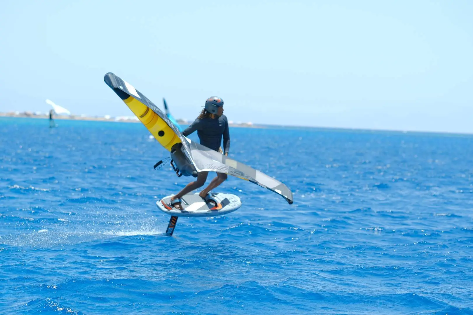 A beginner learning to balance on a board