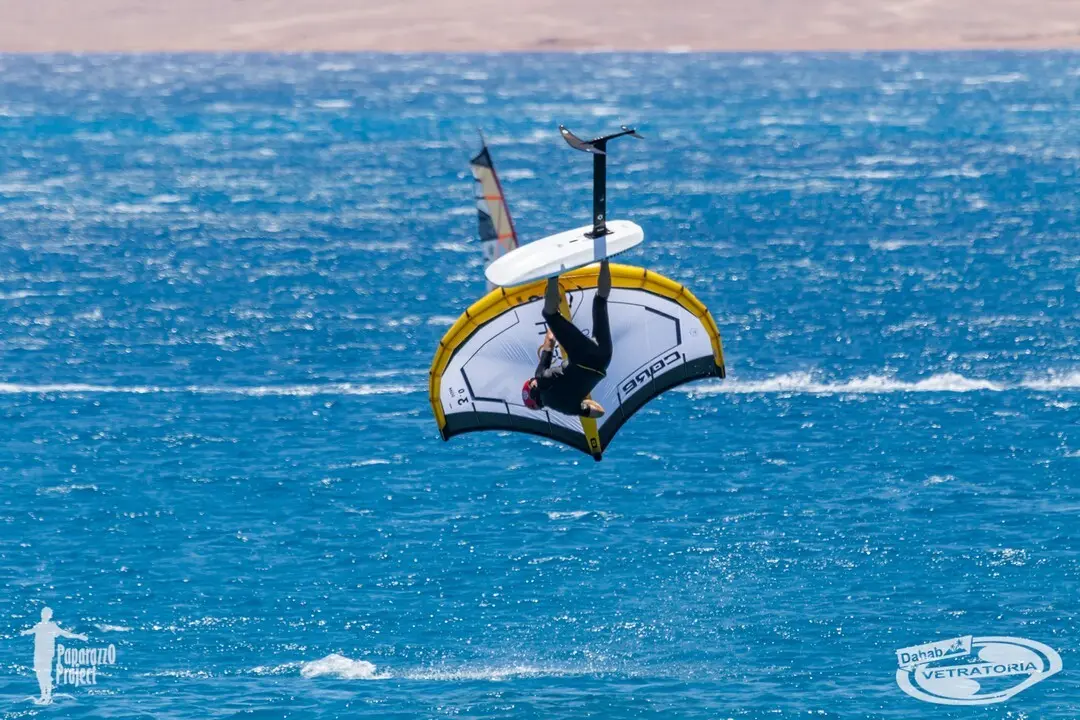 A wingfoil rider above the water